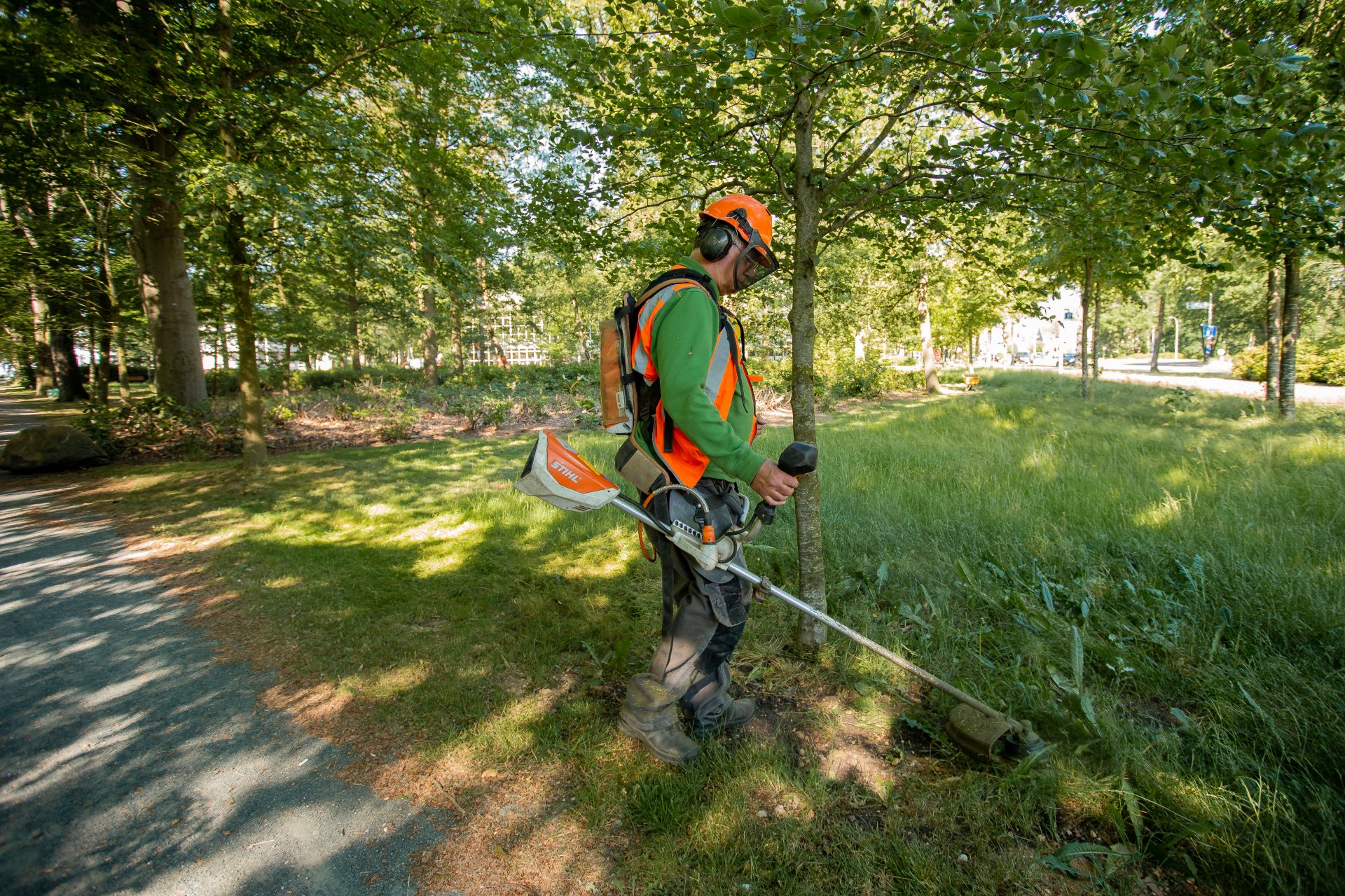 Before the worst of the heat, the landscaping crew is already out and ...